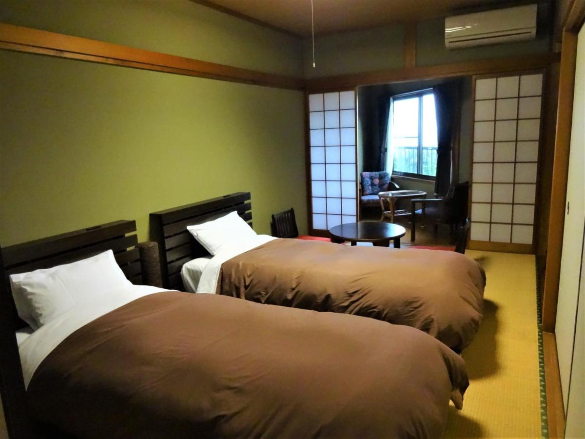 Ryokan Izuna Hotel Atami  Bagian luar foto